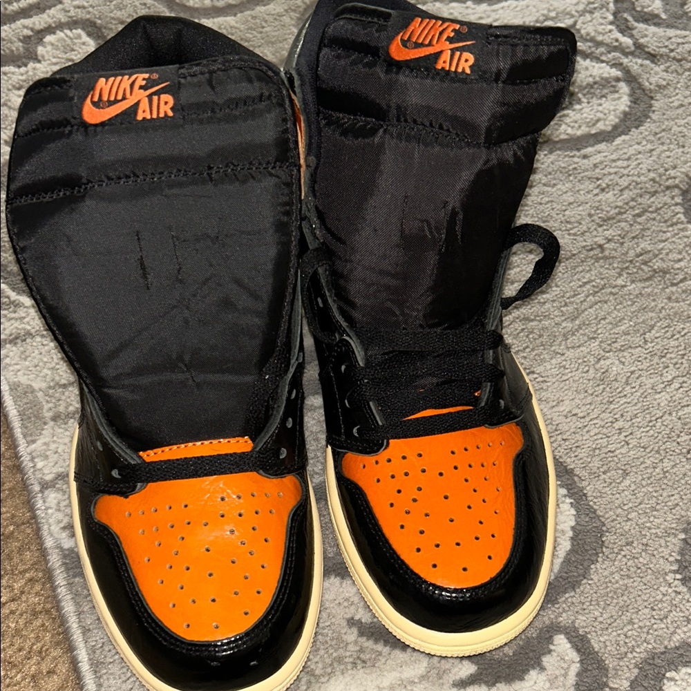 Nike Air Black and Orange High-Tops